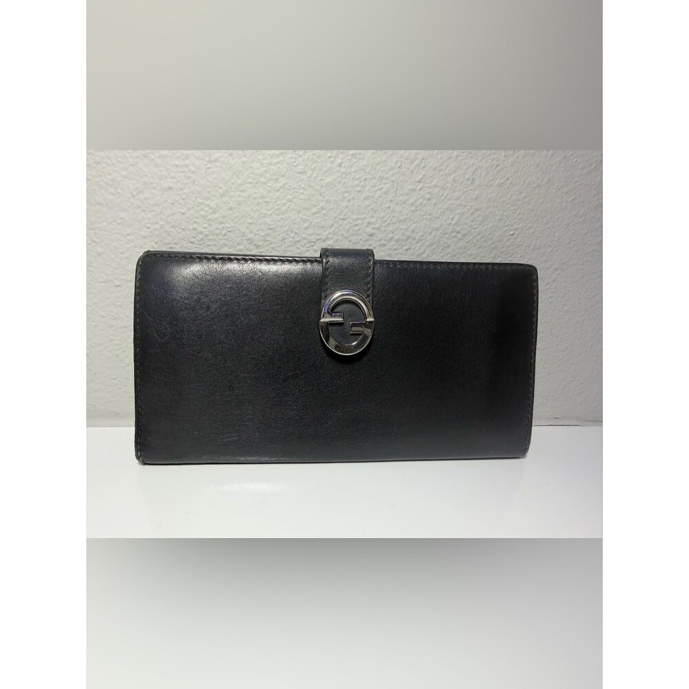 Black Leather Gucci Wallet with Silver 'G' Logo